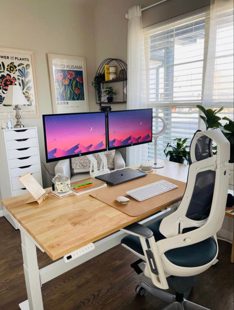 Main workspace with dual monitors showing analytics
